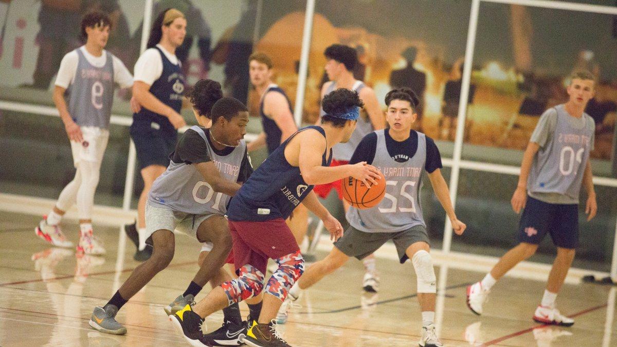 Students playing basketball 